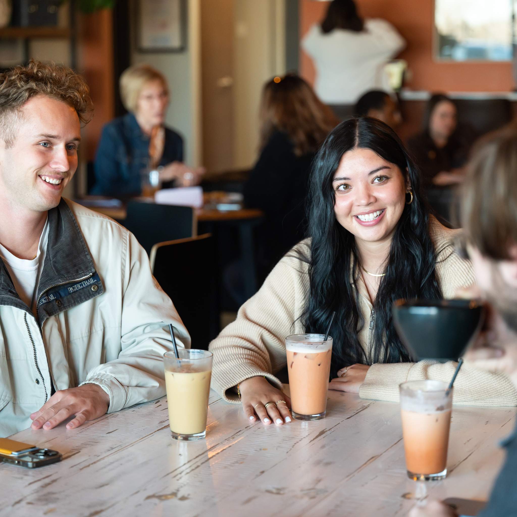 Customers enjoying coffee